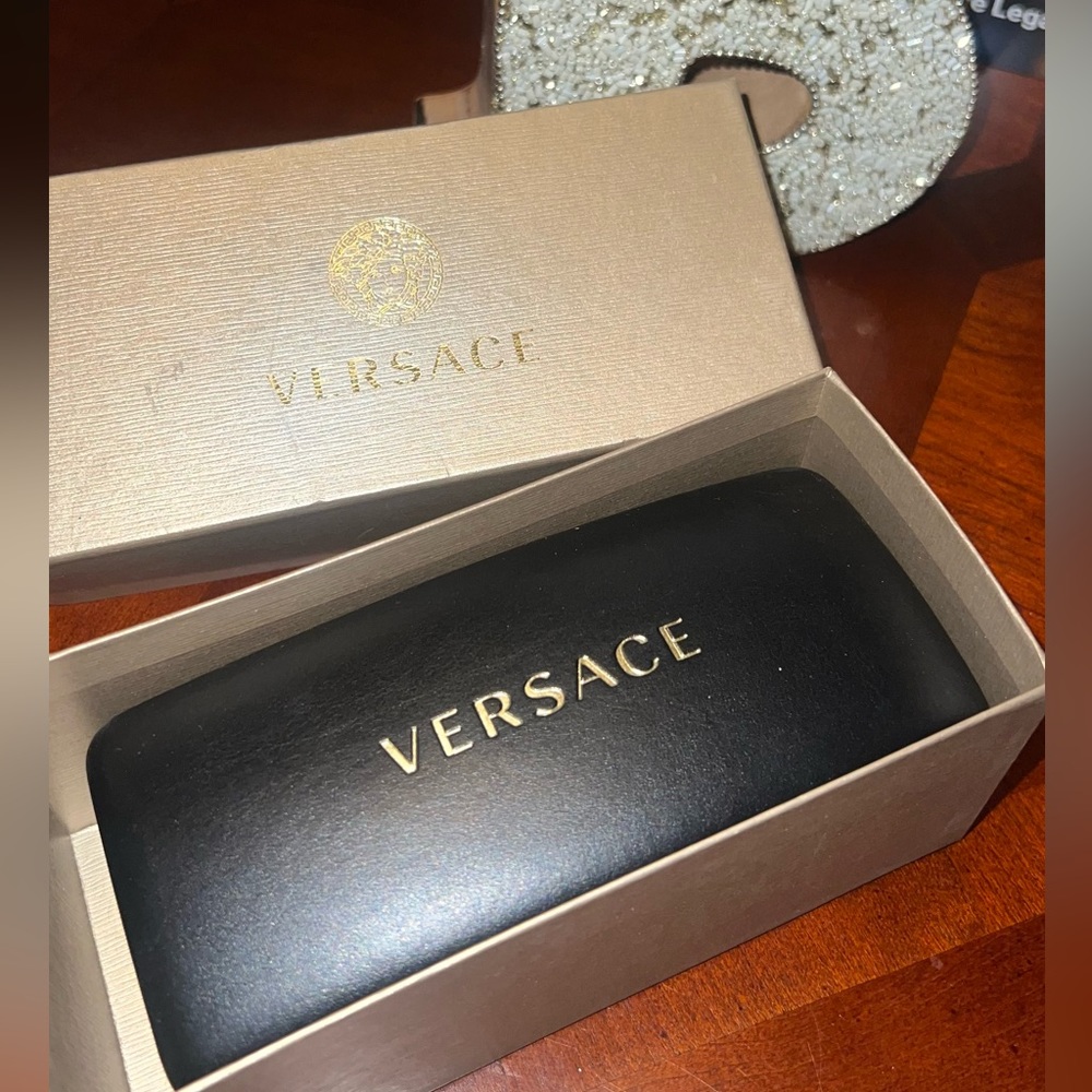 Like New hardshell glasses case by Versace. in its original gold box!